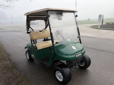 (1) 2017 E-Z-Go golf cart with a Kawasaki gas engine, model 625111G01, includes canopy, ball cover, ...