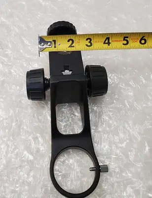 MICROSCOPE FOCUSING MOUNT