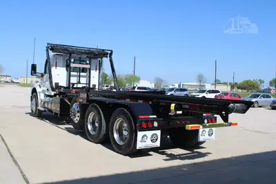 New | in-Stock 2027 PETERBILT 548 Rolloff Trucks Texas US | Roll Off Truck World #1492012