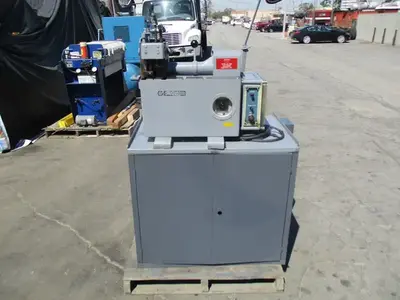 Struers / Discotom Metallurgical Saw with Coolant Pump