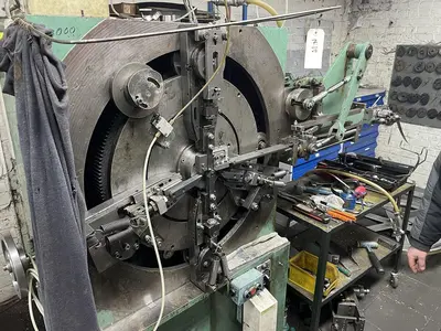 USED BUCH DCM-200 4/40 SPRING MAKING