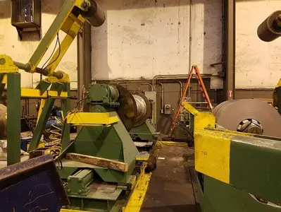 48" X 25,000 LBS. STAMCO SLITTING LINE (USED)