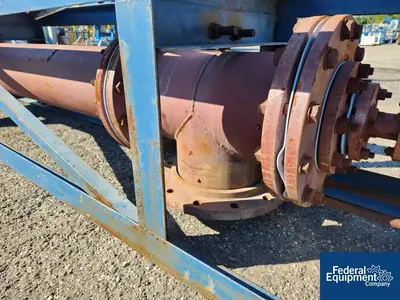 Unknown 12" diameter Teflon Pipe, C/S shell