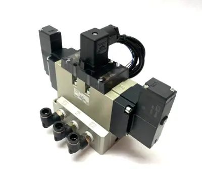 USED SMC 4/5 PORT SOLENOID VALVE 3-POSITION DC21-26V