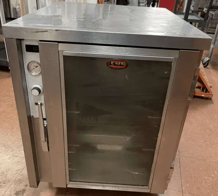 Used FWE Used FWE TS-1826-7 Insulated 1/2 Height Mobile Heated Holding Cabinet 5 Pan 120V Hot Food Warming, Holding, & Transport Cabinets Illinois US | Falcon Restaurant Supply #1376396