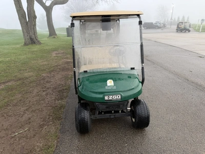(1) 2017 E-Z-Go golf cart with a Kawasaki gas engine, model 625111G01, includes canopy, ball cover, ...