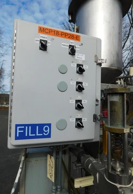 USED FOUR STATION VOLUMETIRIC FILLER FOUR STATION