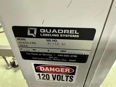 Quadrel model Moduline pressure sensitive wraparound labeler