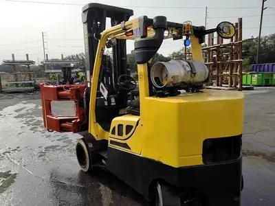 12,000 POUND YALE GLC120VXPRS FORKLIFT TRUCK WITH 60" CASCADE ROLL CLAMP