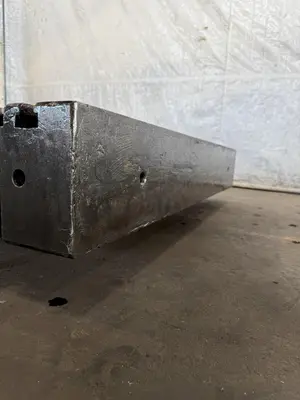 60" WIDE X 67" LONG X 9" THICK T-SLOTTED BOLSTER PLATE. STOCK # 1006324