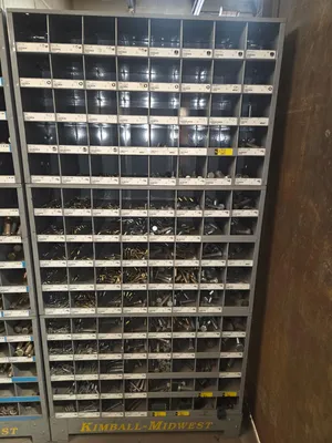 2 stacks of standard nuts, bolts, washers. 1 stack of metric nuts, bolts, washers. Comes with storag...
