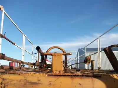 USED 24 M3 (150 BBL) SKID MOUNTED 2 COMPARTMENT MUD TANK