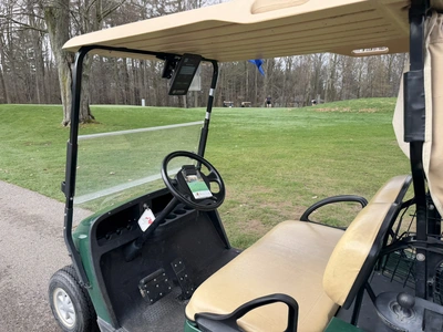 (1) 2015 E-Z-Go golf cart with a Kawasaki gas engine, includes Club canopy and ball washer, fold-dow...