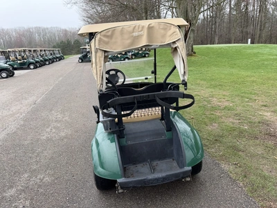 (1) 2015 E-Z-Go golf cart with a Kawasaki gas engine, includes ball washer and Club canopy, ball cov...