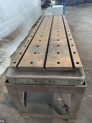 28" WIDE X 84" LONG T-SLOTTED TABLE WITH STAND. STOCK # 0344325