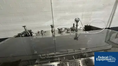 USED Capmatic Capmatic Bottle Filling Line