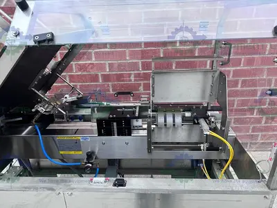 USED ECONOSEAL E SYSTEM 2000 ECONOSEAL CARTONER W/  HOT GLUE SEALING