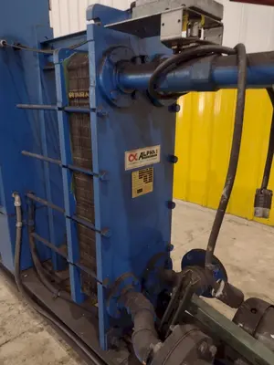 ALPHA1 PARTS QUENCH COOLING SYSTEM: INCLUDES CONTROLS, HEAT EXCHANGER, DIP TANK & PARTS CONVEYOR: STOCK #21690