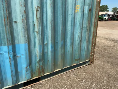 20’ Shipping / Storage Container 8’ wide x 8’ 6” tall, swing doors on one end, wood deck, rings for ...