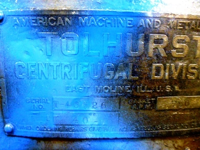 Tolhurst 40" Center-Slung chip wringer.