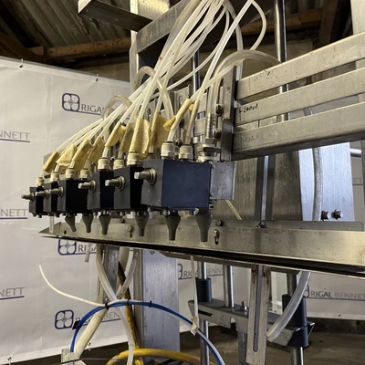 6 Head ELF Filler with feed tanks & container link belt conveyor