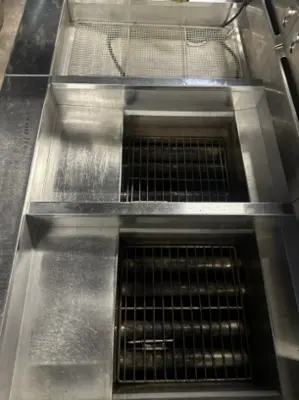 174-0002 Pitco SSH55 and SSHBN55 Battery of 4 Fryers with Middle Dump Station an