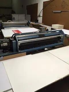 Mounter -Mounts printed sheets onto board