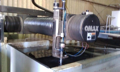 USED 2004 OMAX 55100