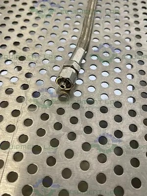 USED 24" STAINLESS STEEL BRAIDED HOSE W/ 1/2" NPT FITTING