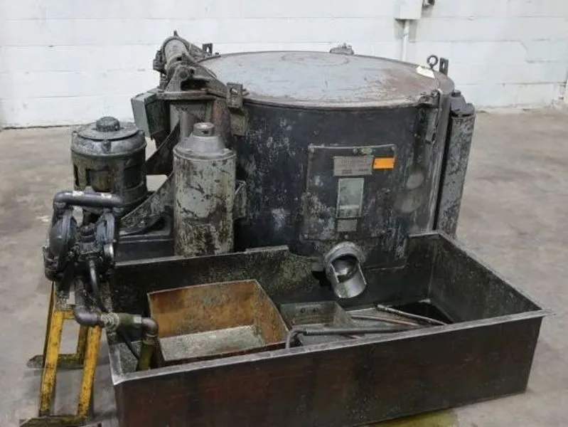 (2) Tolhurst 40" Center-Slung chip wringers.