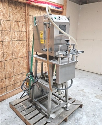 Capmatic Model CF-2P Tabletop Semi-Automatic Filler