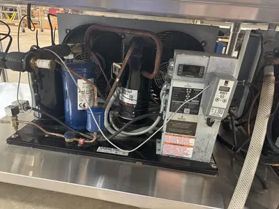 USED 2016 LESLIE FISHER ENGINEERING INC. STAINLESS STEEL CHILLER TABLE