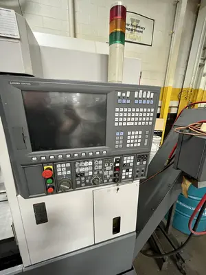 USED 2011 OKUMA LB3000EX-MWY/450
