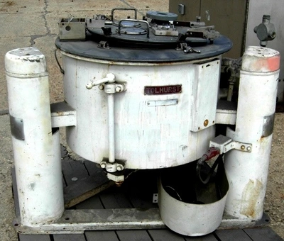 Ametek 26 X 12 perforate basket centrifuge, rubber-lined.