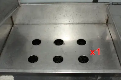 SPC7654  Miscellaneous Equipment bottle dump station Stainless Steel 14 each 1-5/8" diameter holes holes, 17"W x 41-½"L x 36-1/2"H