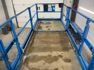 Used 2014 GENIE GS-4390RT ROUGH TERRAIN SCISSOR LIFT Scissor Lifters Alberta CA | Adcock Equipment #1418030