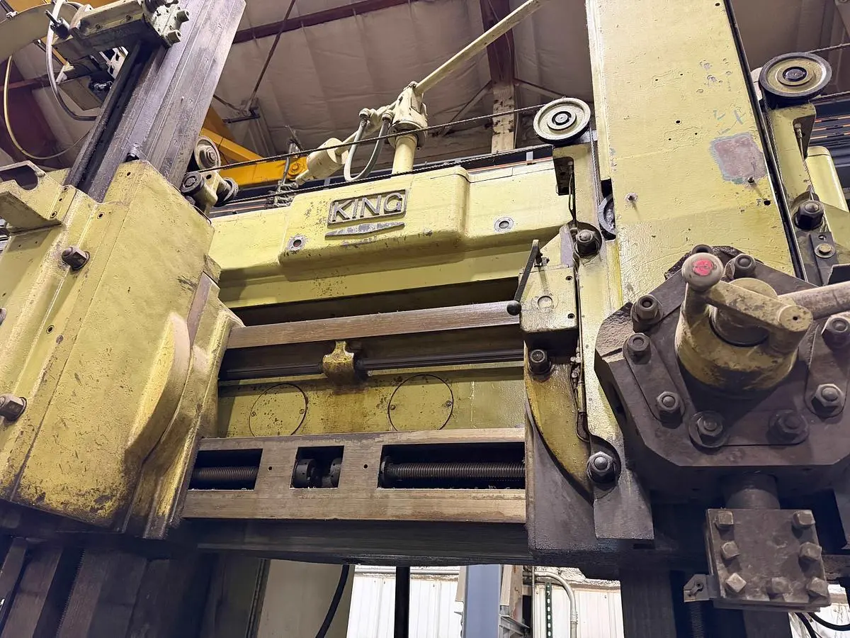 King Vertical Boring Mill, 62" Table, 72" Swing, 72" Under Rail. 40 HP 65 RPM, (1) Ram Heads, (1) Turret Head, (1) Side Head
