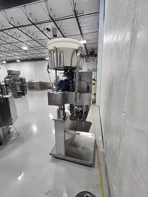 XGC-100 automatic quill capper