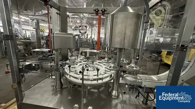 USED Capmatic Capmatic Bottle Filling Line