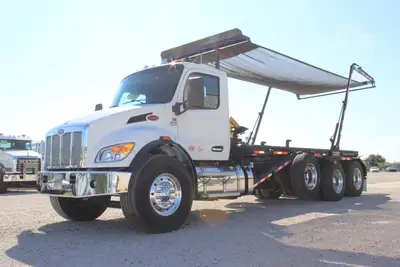 New | in-Stock 2027 PETERBILT 548 Rolloff Trucks Texas US | Roll Off Truck World #1492018