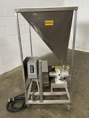 Progressive Cavity Pump With Hopper