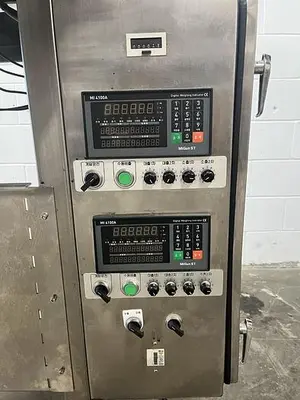 Vibratory Net Weight Bucket Filler