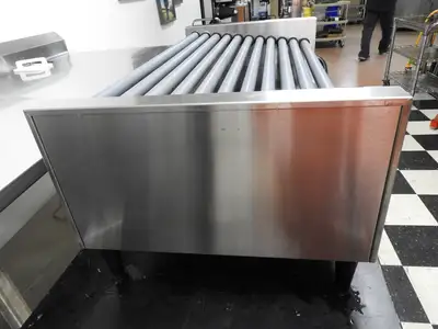 Used Nemco Used Nemco 8250-SLT 50 Commercial Hot Dog Roller Grill - Slanted Top, 120v Grills & Griddles Illinois US | Falcon Restaurant Supply #1376520