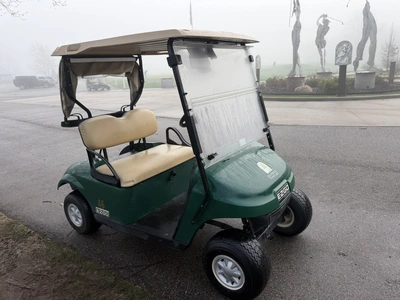 (1) 2017 E-Z-Go golf cart with a Kawasaki gas engine, model 625111G01, includes canopy, ball cover, ...