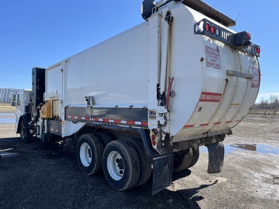 USED 2013 MACK LEU633 REFUSE PACKER BODY WITH AUTO ARM.