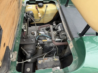 (1) 2014 E-Z-Go golf cart with a Kawasaki gas engine, does not include Club canopy, ball carrier, fo...