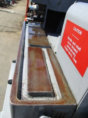Struers / Discotom Metallurgical Saw with Coolant Pump