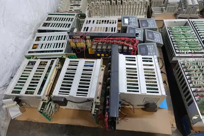 4 PALLETS OF ASSORTED CHASSIS, MODULES AND POWER SUPPLIES; OVATION, HONEYWELL, GE, MODICON