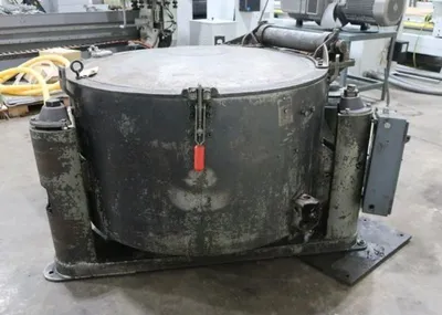 (2) Tolhurst 40" Center-Slung chip wringers.