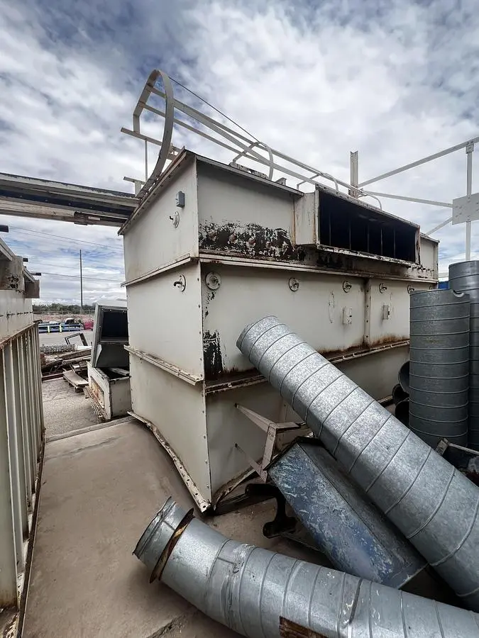 Air conveying scrap system with 100's of feet of piping